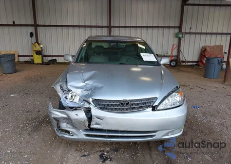 2004 Toyota Camry Xle z USA, uszkodzony, nr VIN 4T1BE32K04U865460
